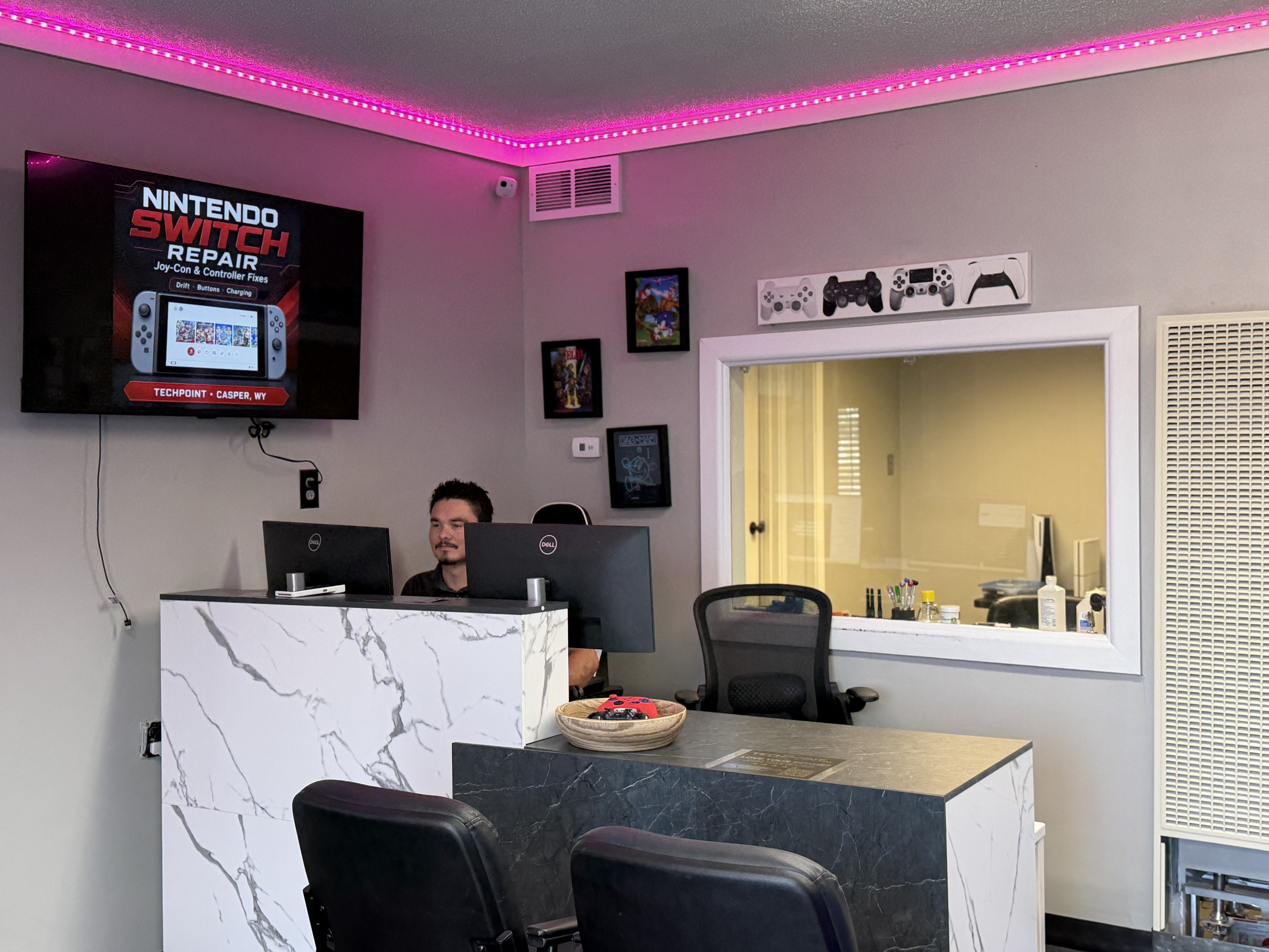 Inside TechPoint LLC storefront counter and repair diagnostic station at 2325 E 12th St in Casper, WY