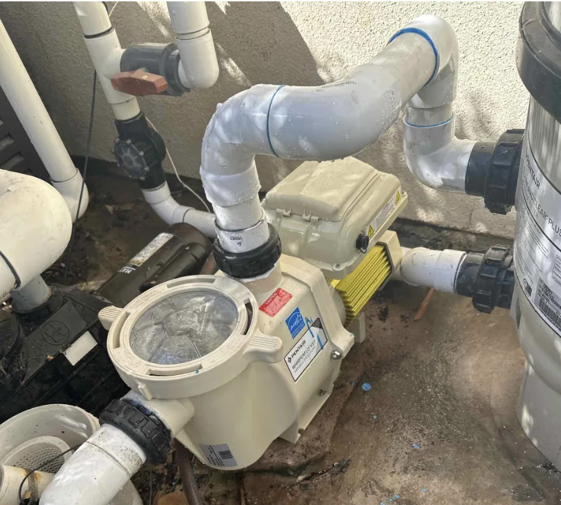 Pentair variable speed pool pump installed with plumbing and filtration equipment