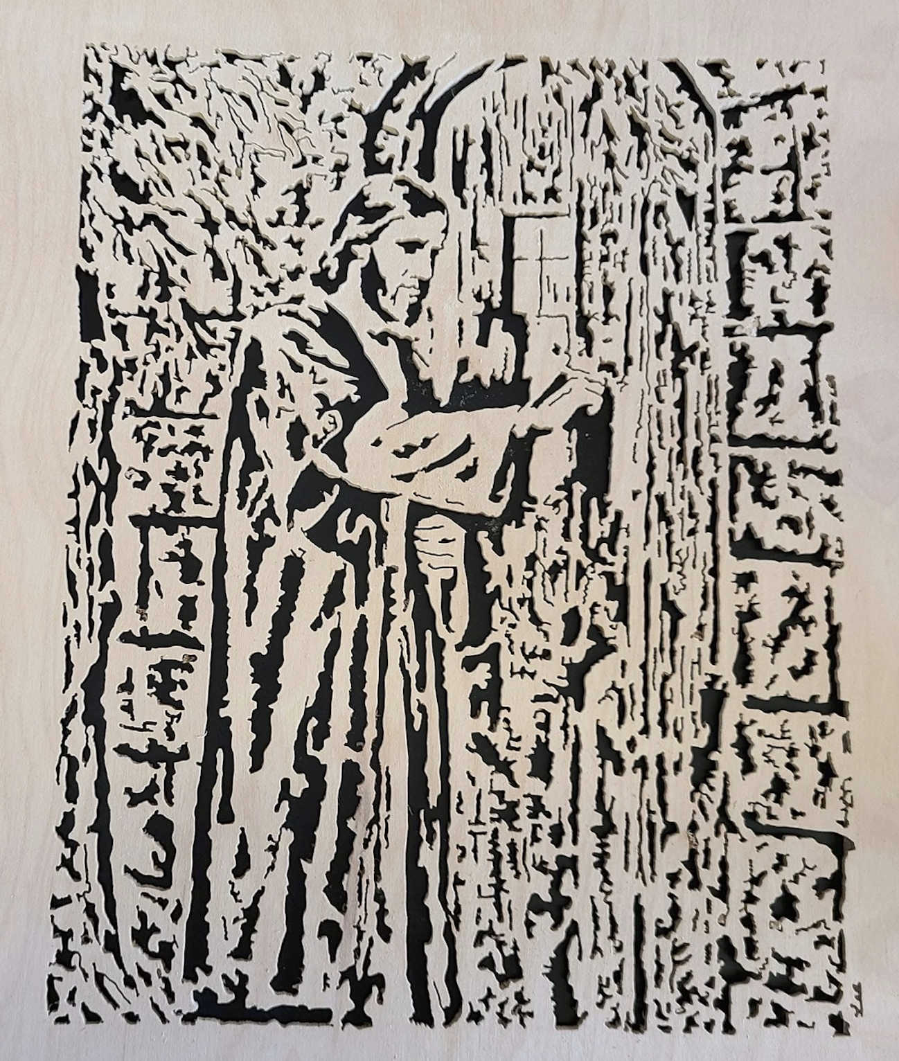 Detailed fretwork wood cut of Christ knocking at the door
