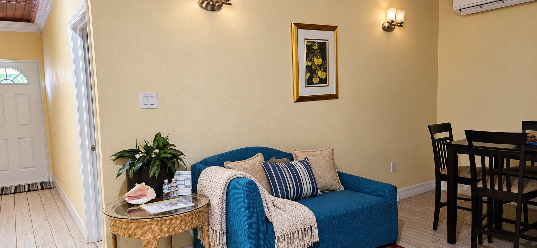 Cozy living and dining area with comfortable sofa bed seating