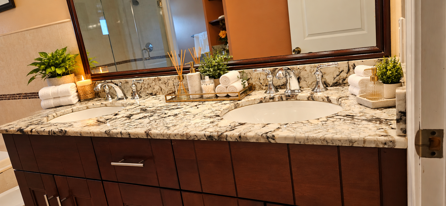 Master bathroom: double granite vanity with luxury amenities and ambient lighting