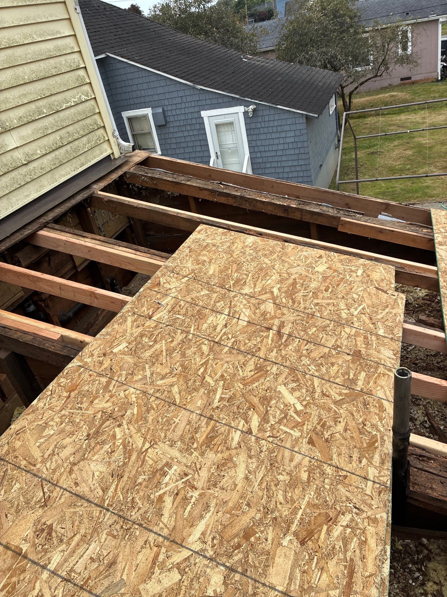 Sub-roof re-framing & OSB sheathing