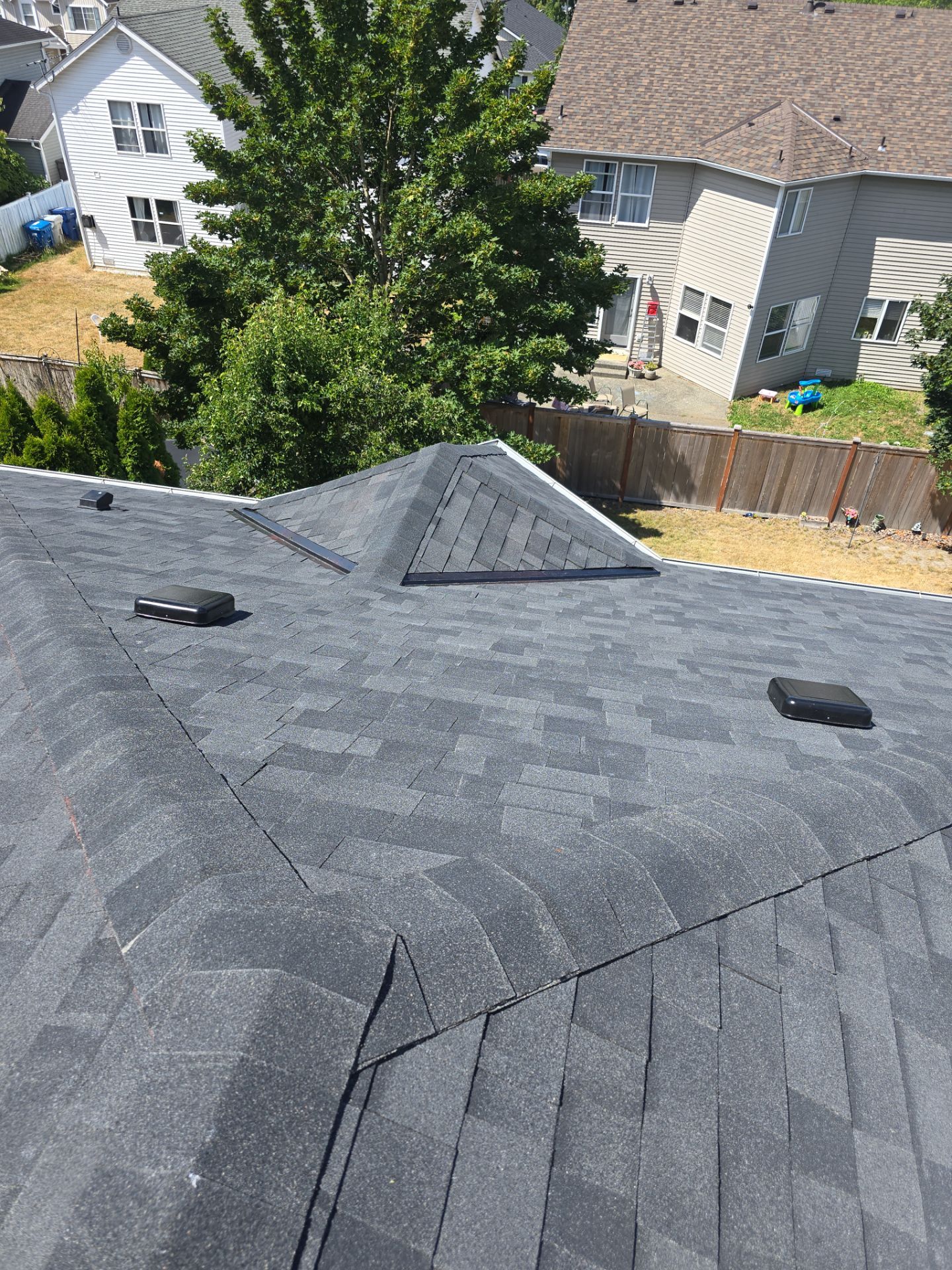Finished roof replacement project on a Puget Sound home