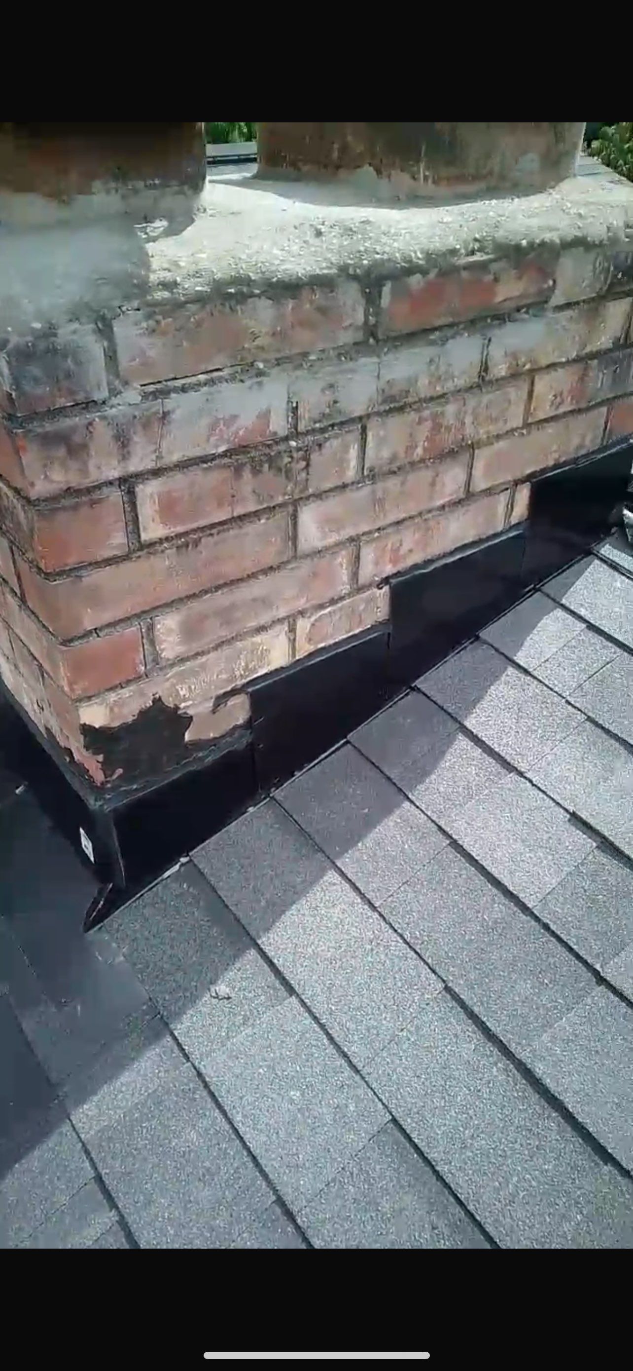 Custom chimney step and counter flashing installation