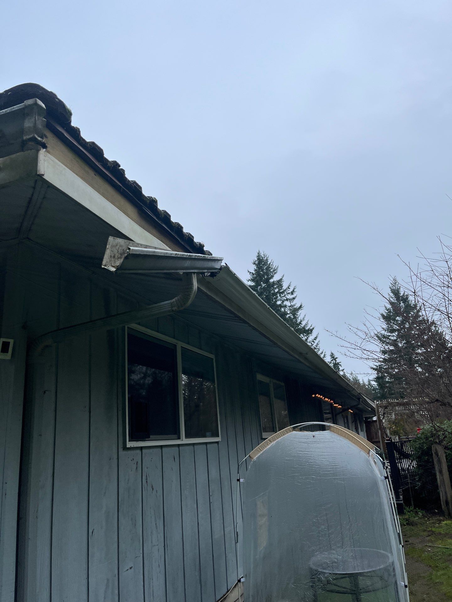Detached, Leaking Gutters to Heavy-Duty Seamless System — before