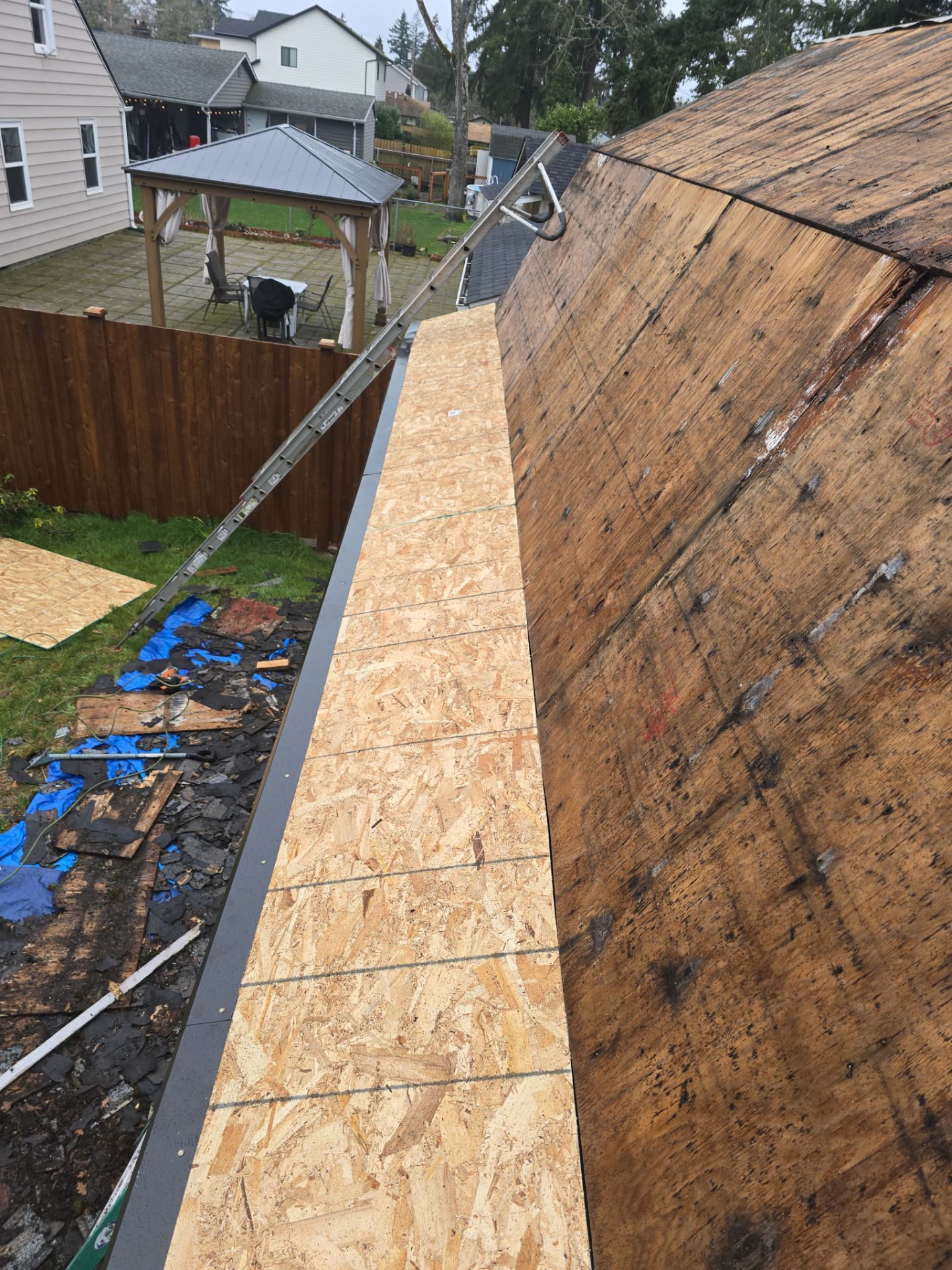 Complete Roof Tear-Off & Decking Rebuild — in progress