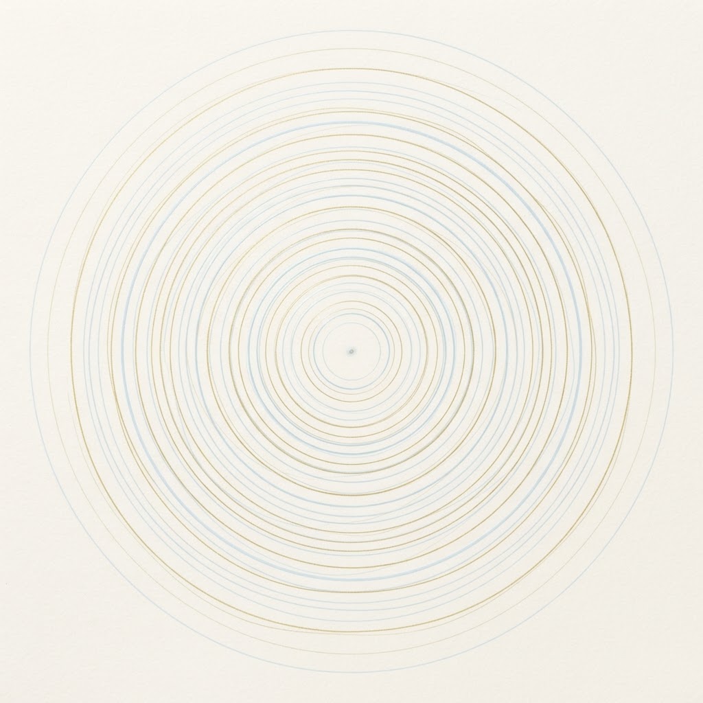 Gentle concentric ripples in pale blue and gold