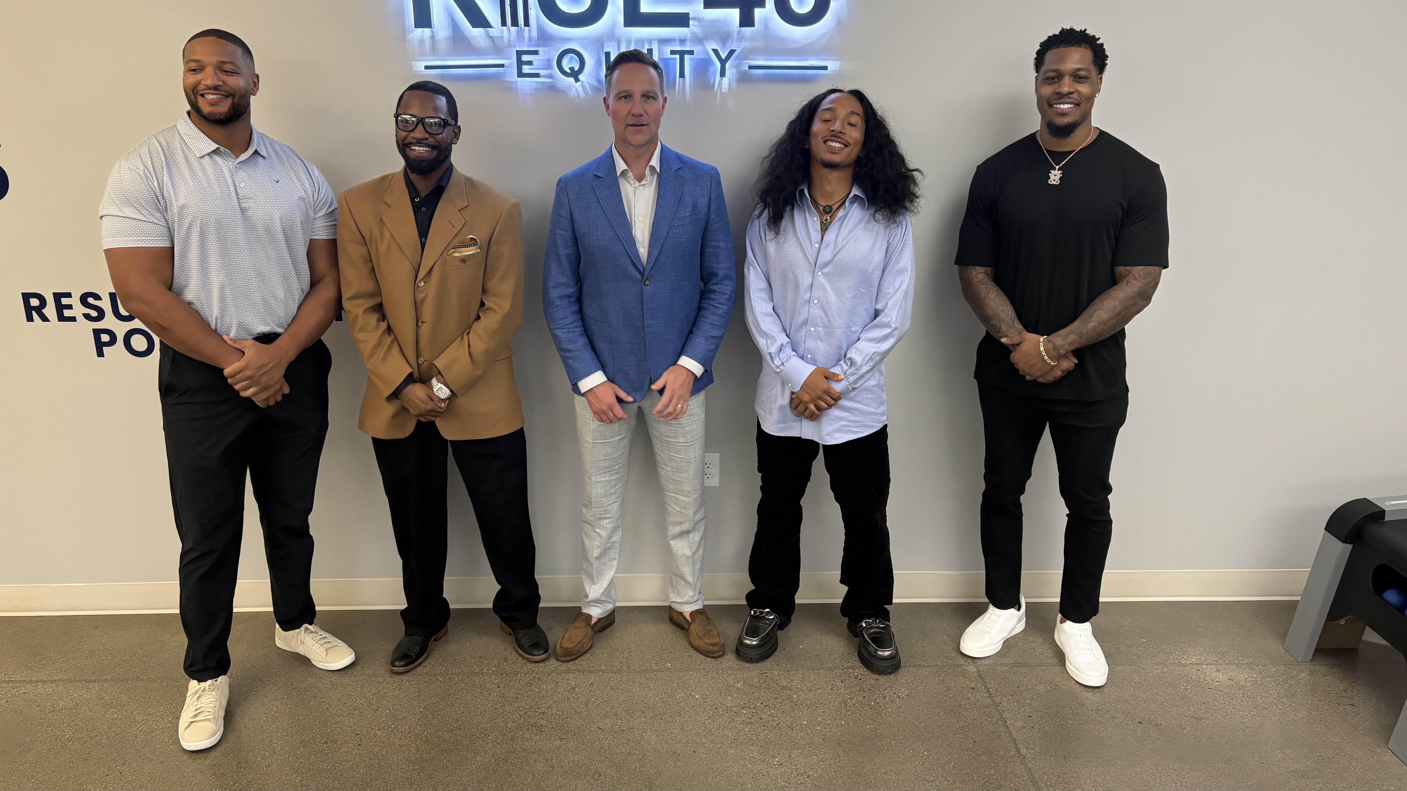 Athletes, co-founders, and mentors collaborating on investor education and ownership