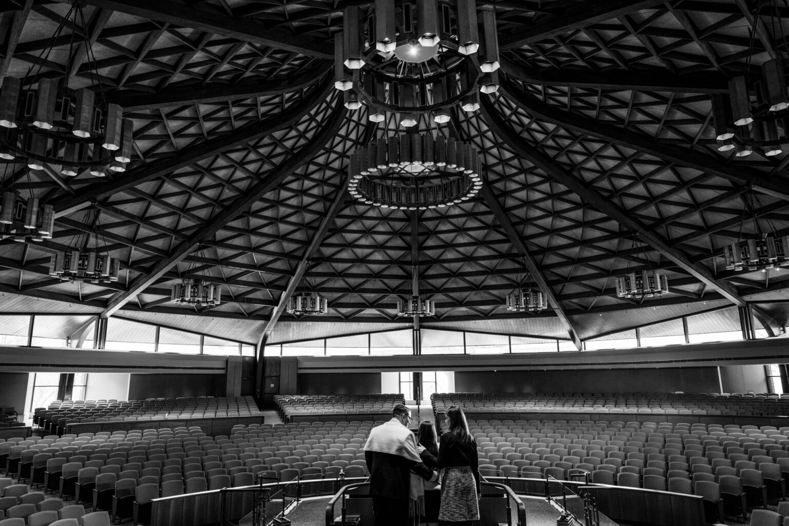 Emotional wedding ceremony moment in timeless black and white