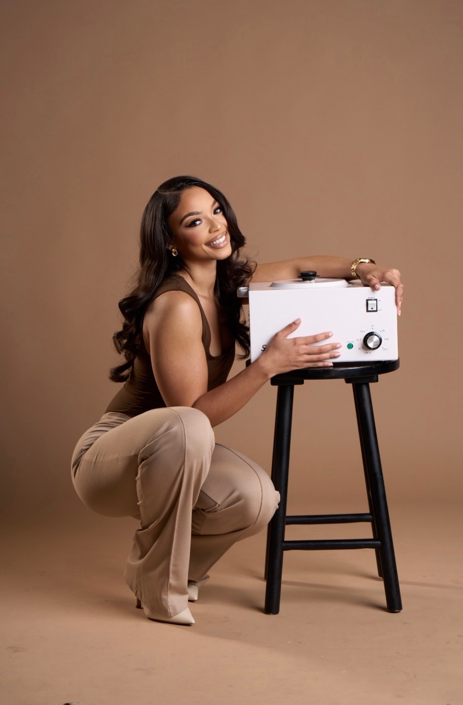 Jaz, licensed esthetician and owner of Queen Beauty HTX