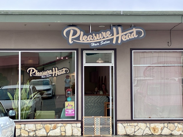 Pleasure Head Hair Salon storefront at Seabright Plaza