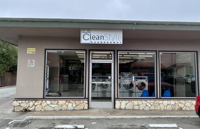 CleanStyle Laundromat front entrance and washing machines