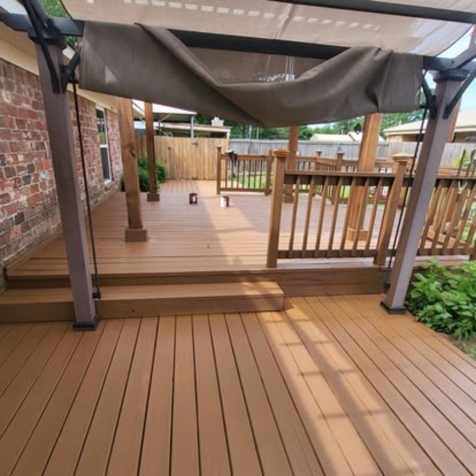 Multi-level deck and pergola after restoration - fresh rich cedar stain and weather protection