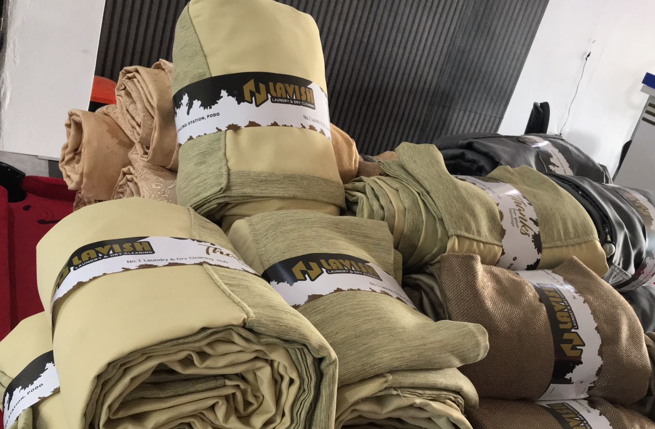Lavish branded packaged laundry and duvets ready for delivery