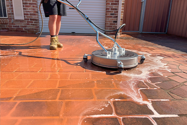 Professional rotary pressure cleaning on outdoor pavers in Geelong