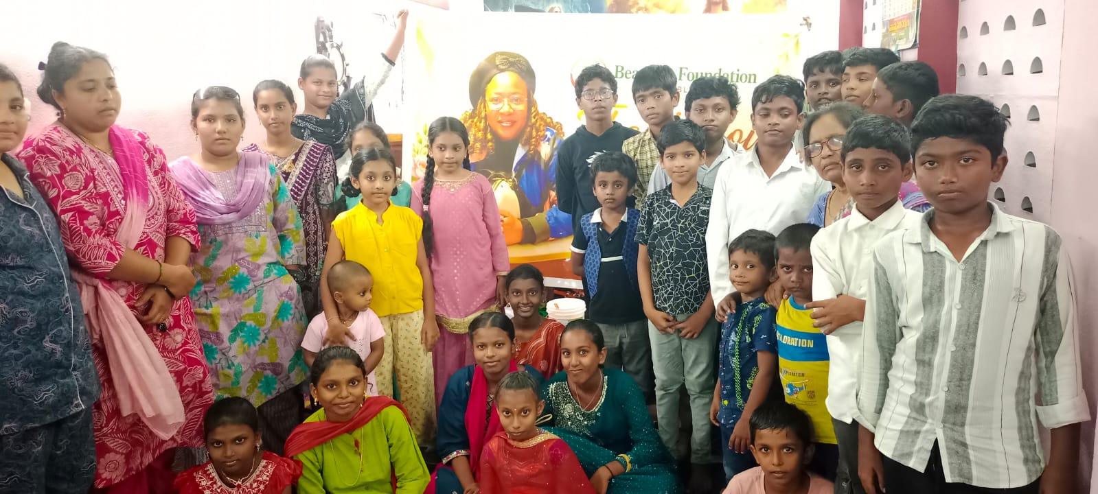 Youth group smiling together at outreach program