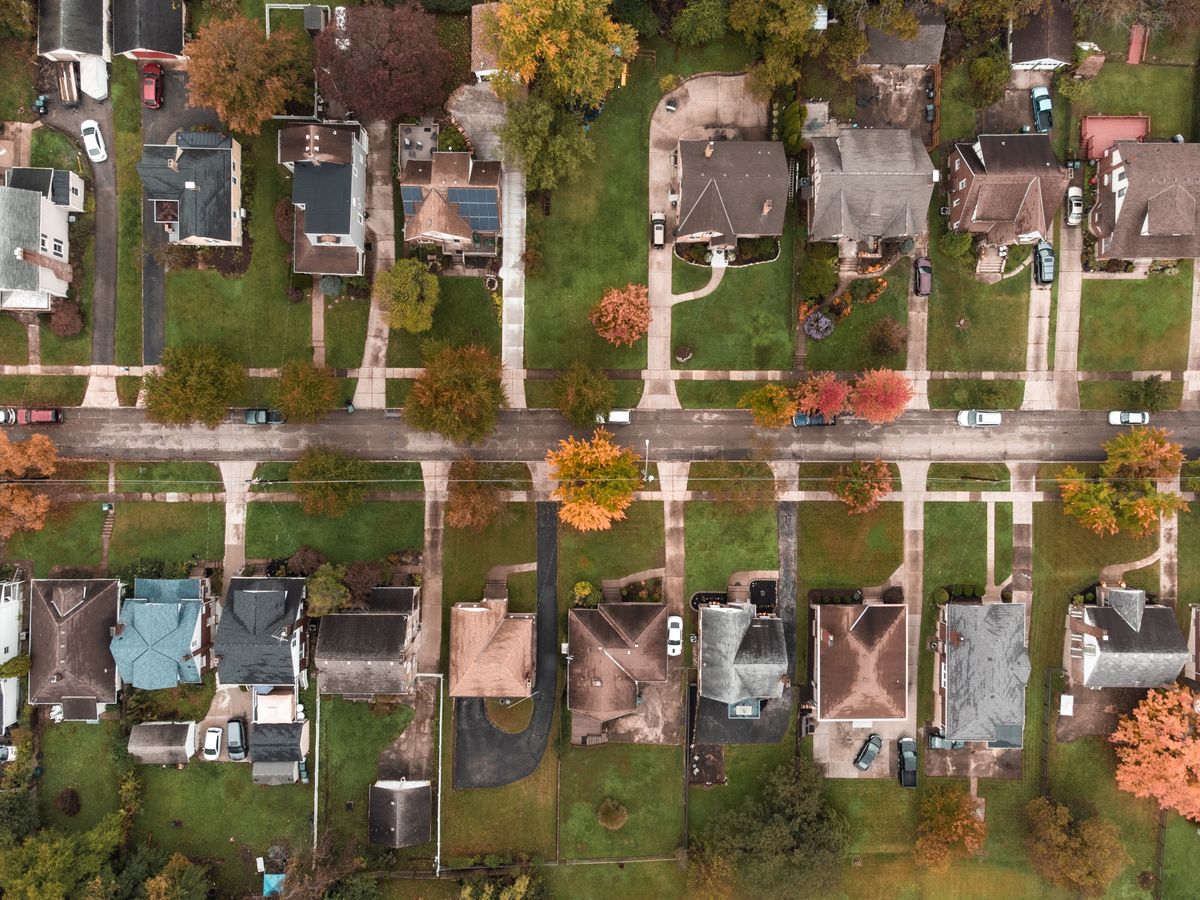 aerial suburban town view showing changing seasons for a seasonal local marketing strategy by city