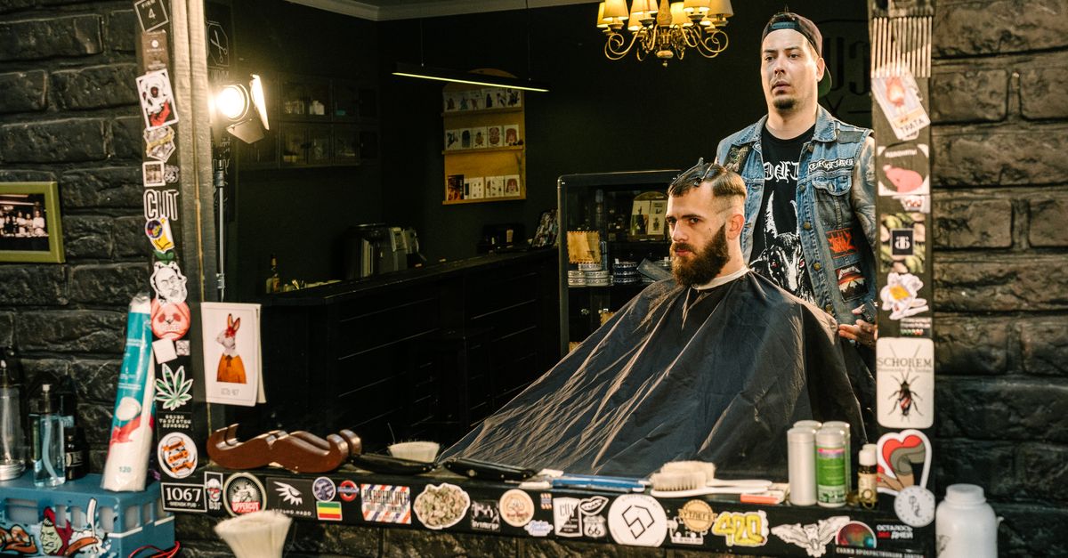 hair stylist cutting a client's hair in a salon in front of a mirror — visual overview for Salon & Spa Rebooking Automation: Fill Every Chair Automatically
