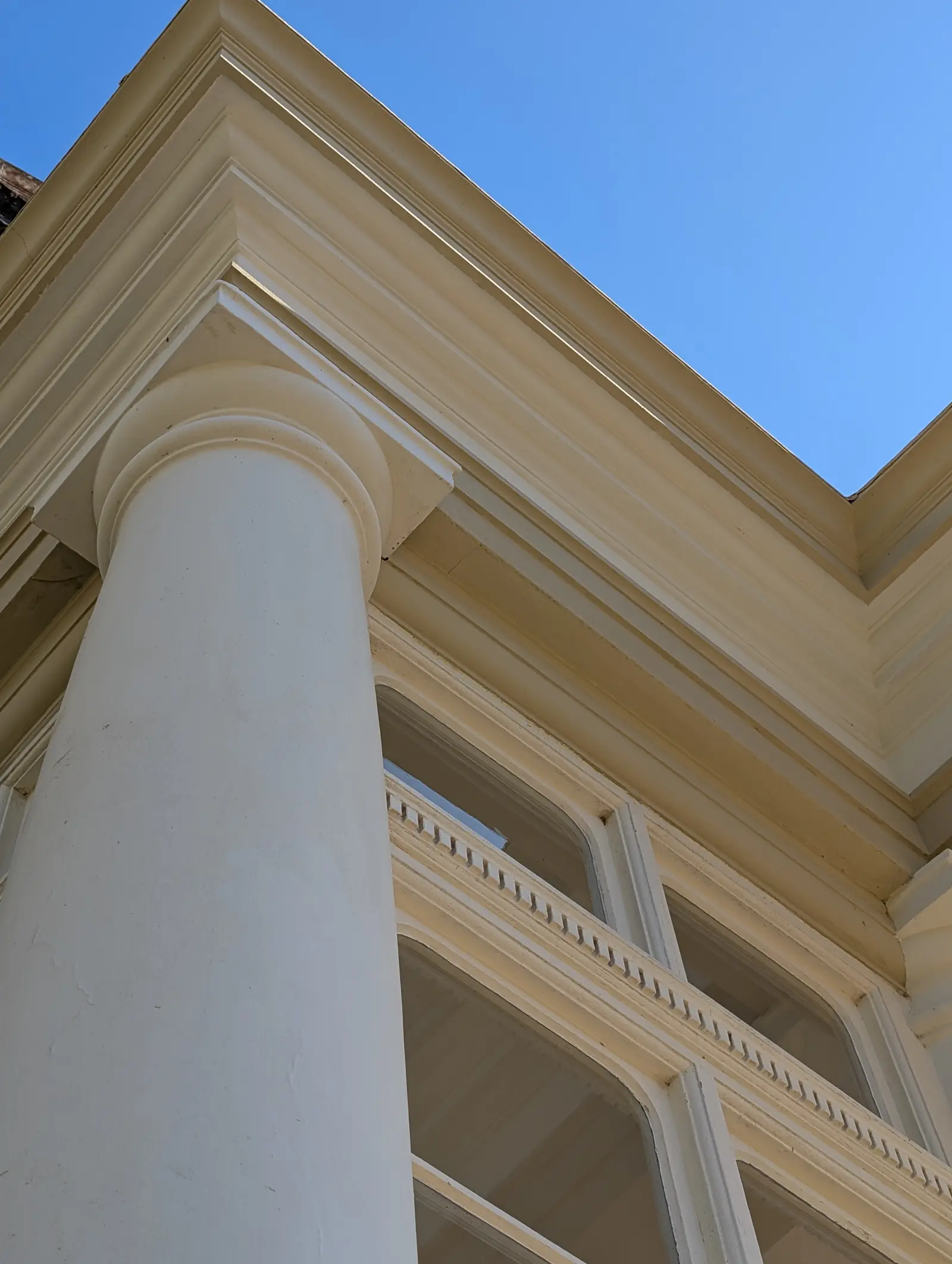 Portico at Pylewell Park, historic mansion restoration — turned timber balustrade