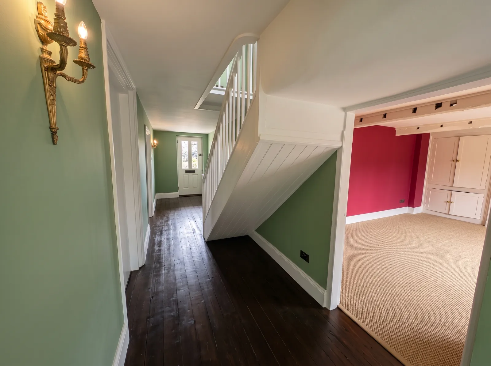 Downstairs hallway at Carters Farm, a listed farmhouse at Norley Wood
