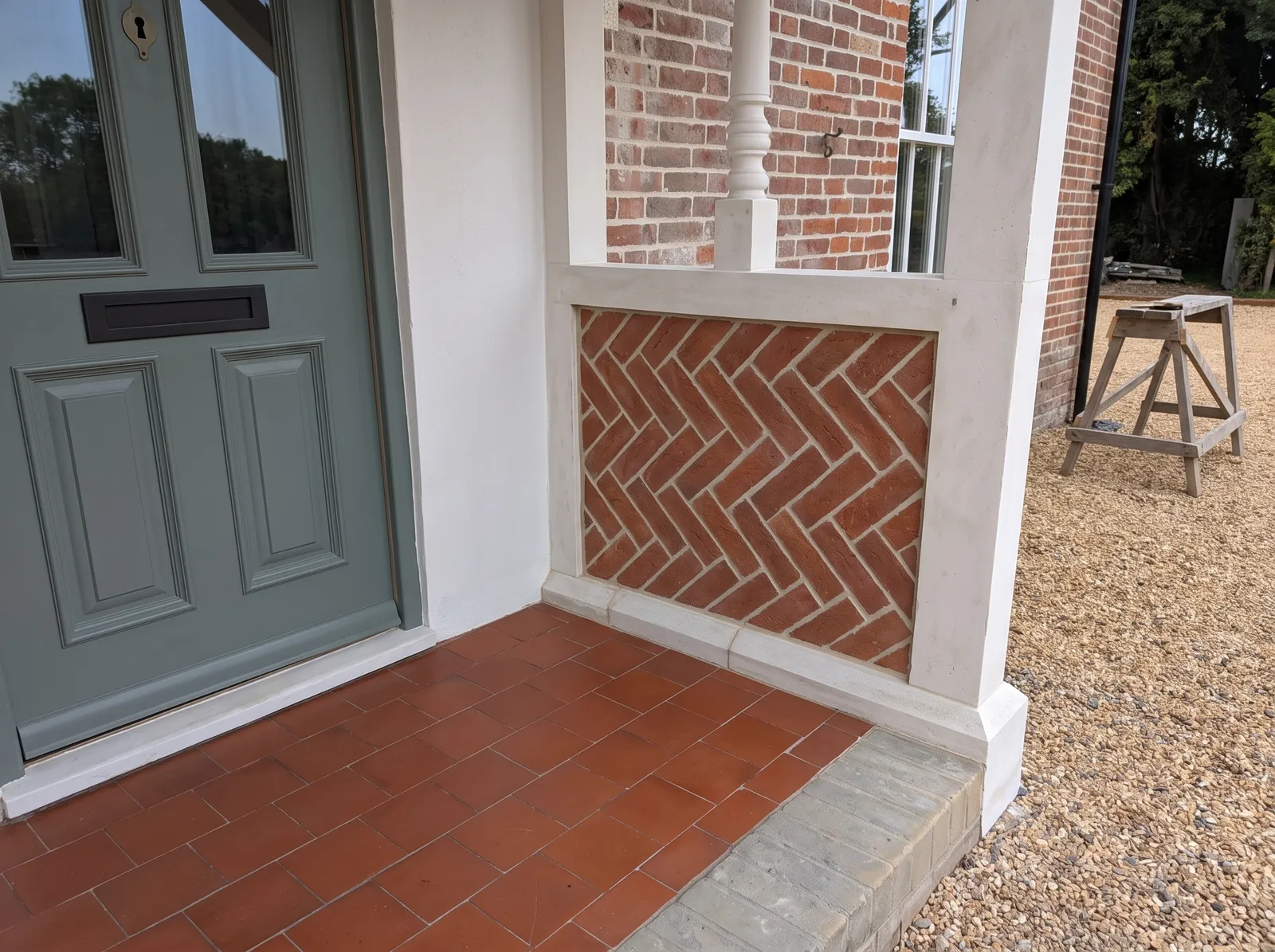 Herringbone brick porch detail at Carters Farm, a listed farmhouse in the New Forest