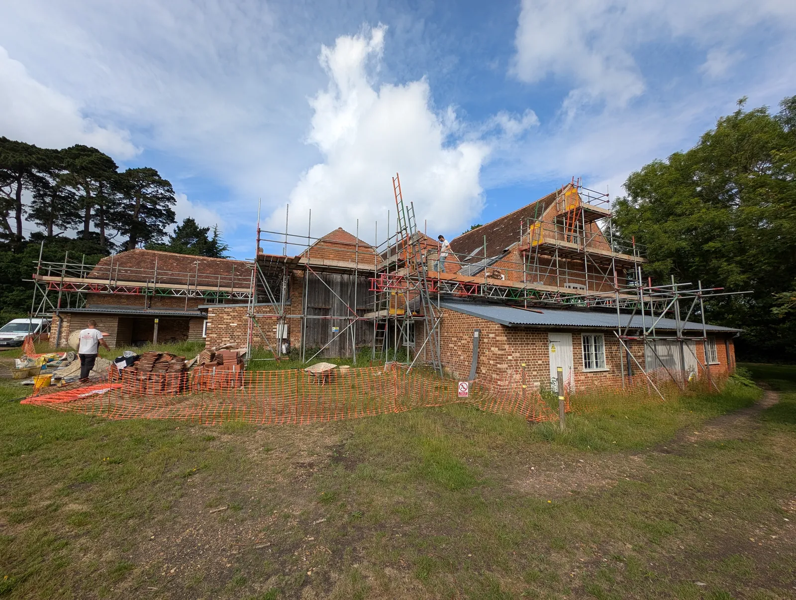 The Mill roof refurbishment and conversion — traditional brick and oak-beam construction