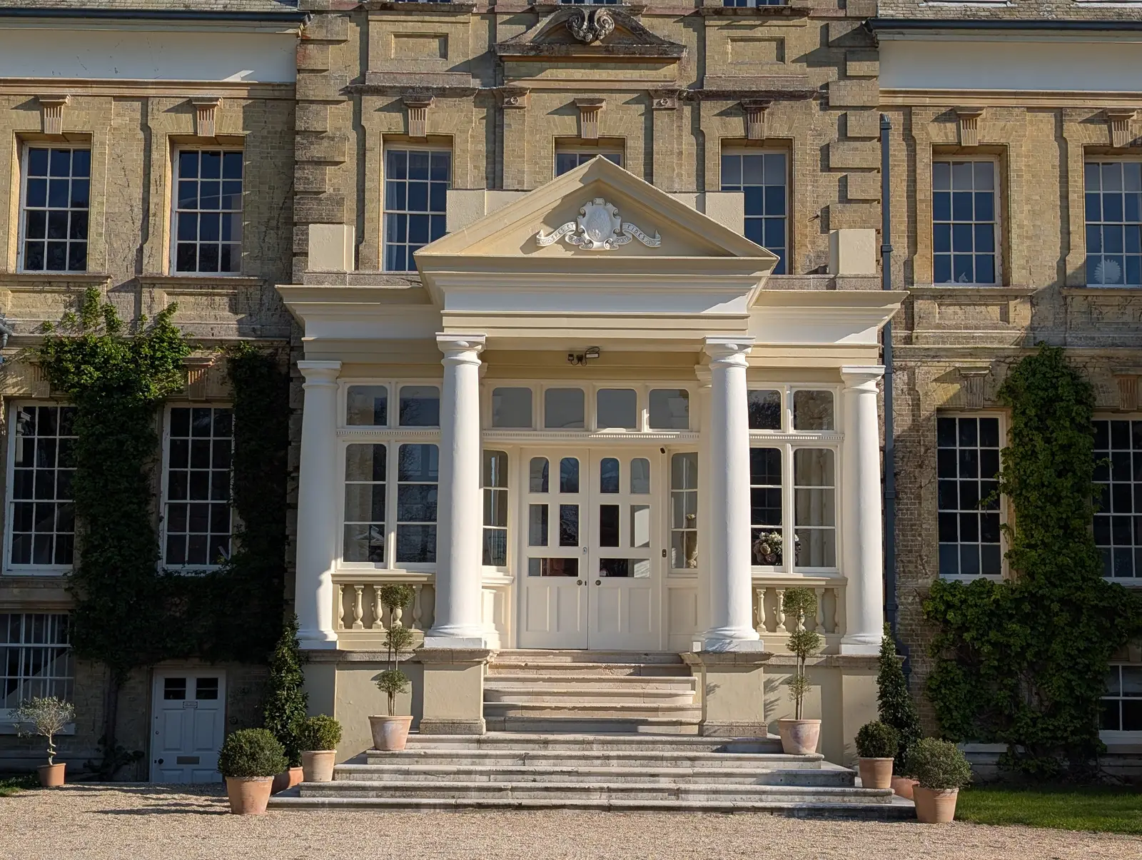 Portico at Pylewell Park, historic mansion restoration — completed restoration