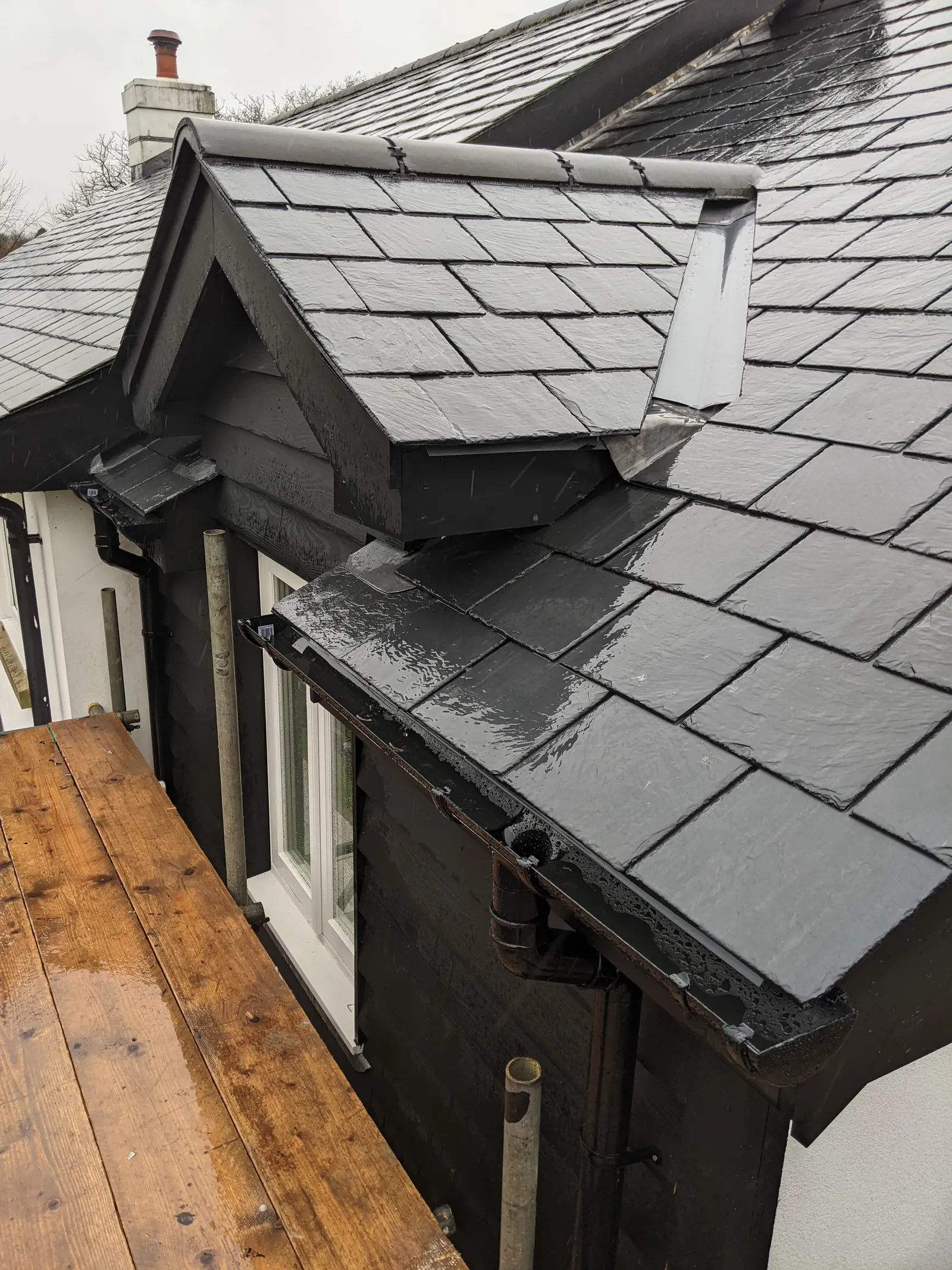 Roof detail of the Peppercorn extension, a timber-clad addition in Sway