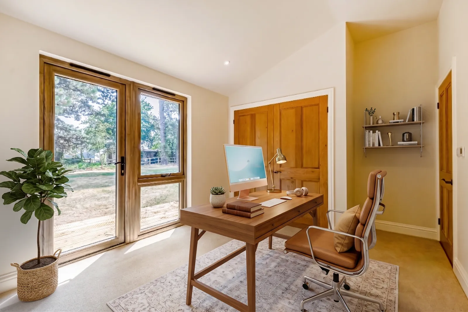 Open-plan kitchen and dining room at Monterey Lodge, a new-build home in the New Forest