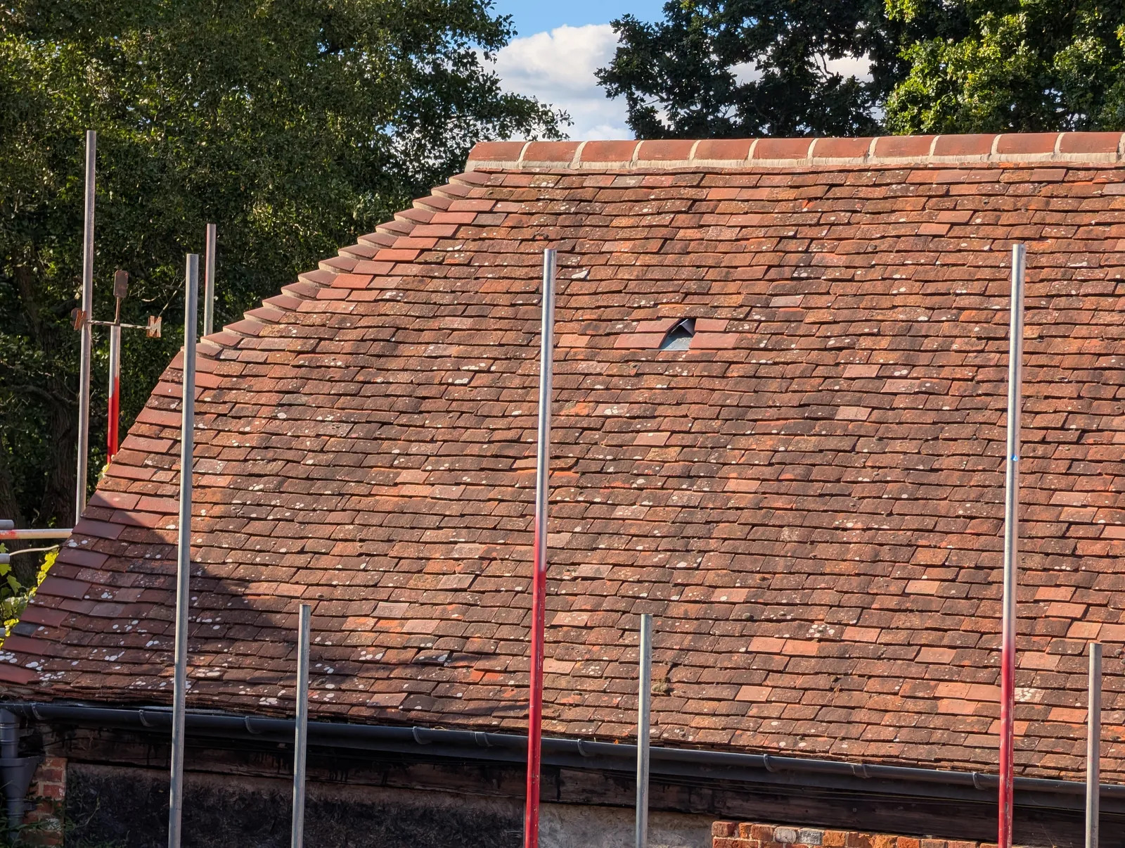 The Mill roof refurbishment and conversion — traditional brick and oak-beam construction