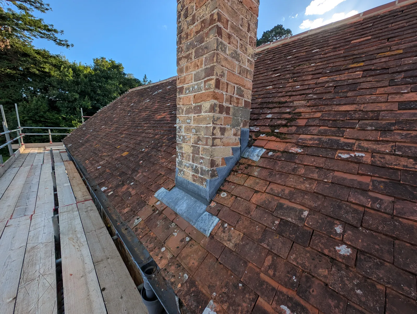 The Mill roof refurbishment and conversion — the mill building and its roof under refurbishment