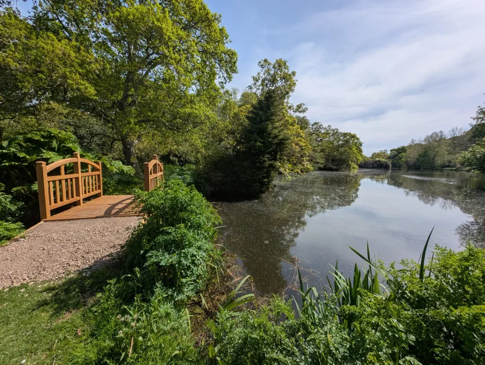 The Bridges at Pylewell Lakes, a recreated century-old Japanese oak-timber bridge across the estate's ponds and lakes