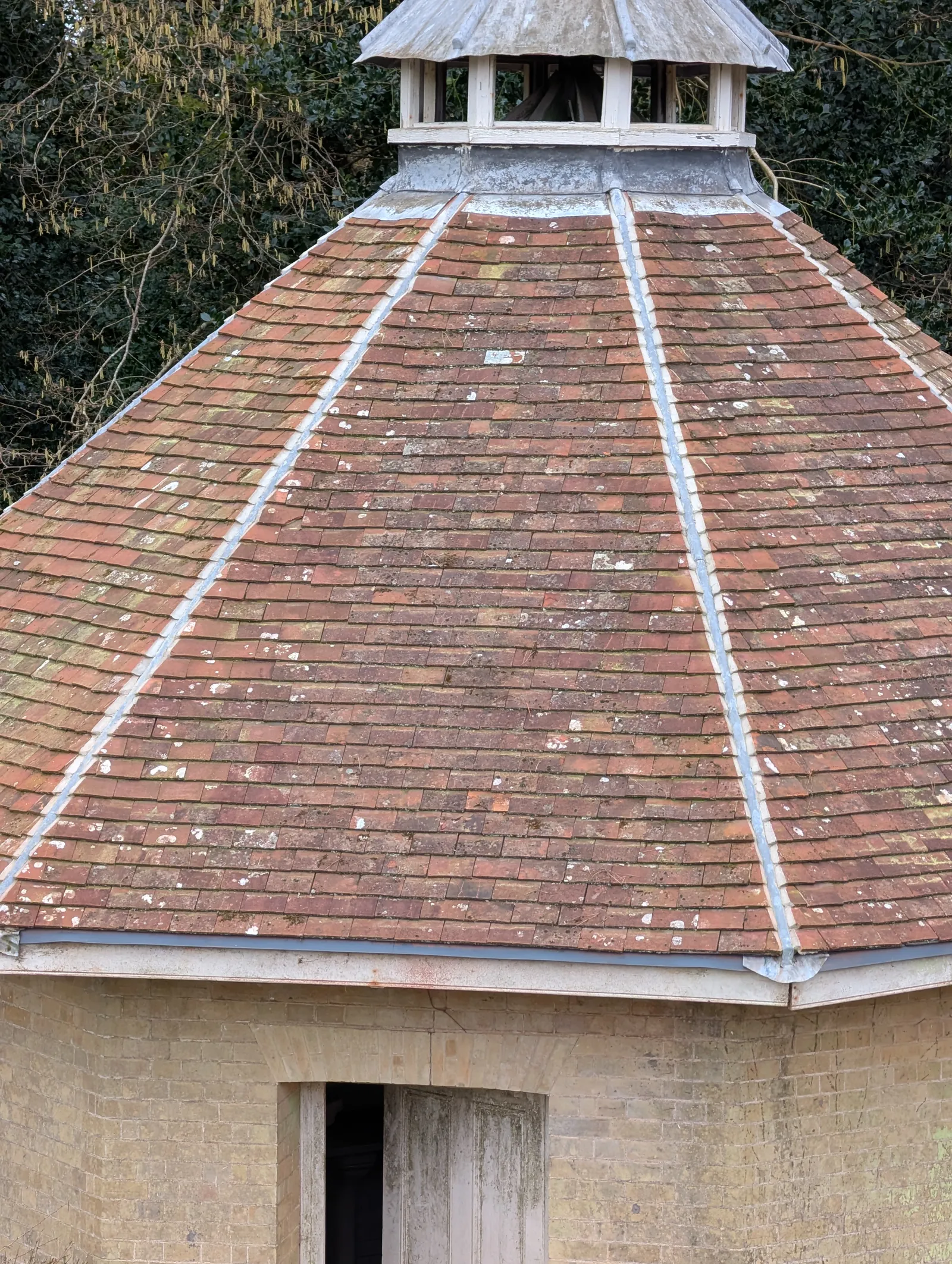 The Dairy at Pylewell Park, historic outbuilding refurbishment — the lead parapet funnel detail