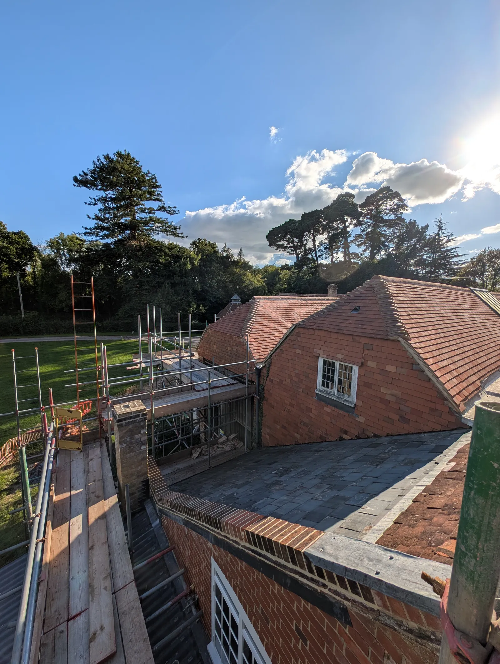 The Mill roof refurbishment and conversion — the mill building and its roof under refurbishment