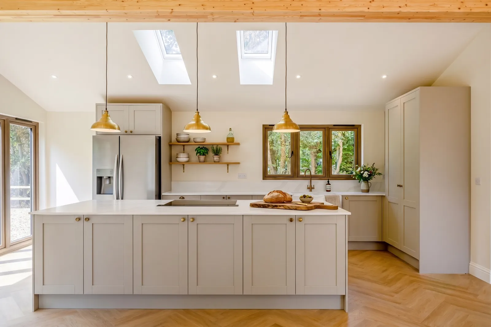 Principal bedroom at Monterey Lodge, a new-build home in the New Forest