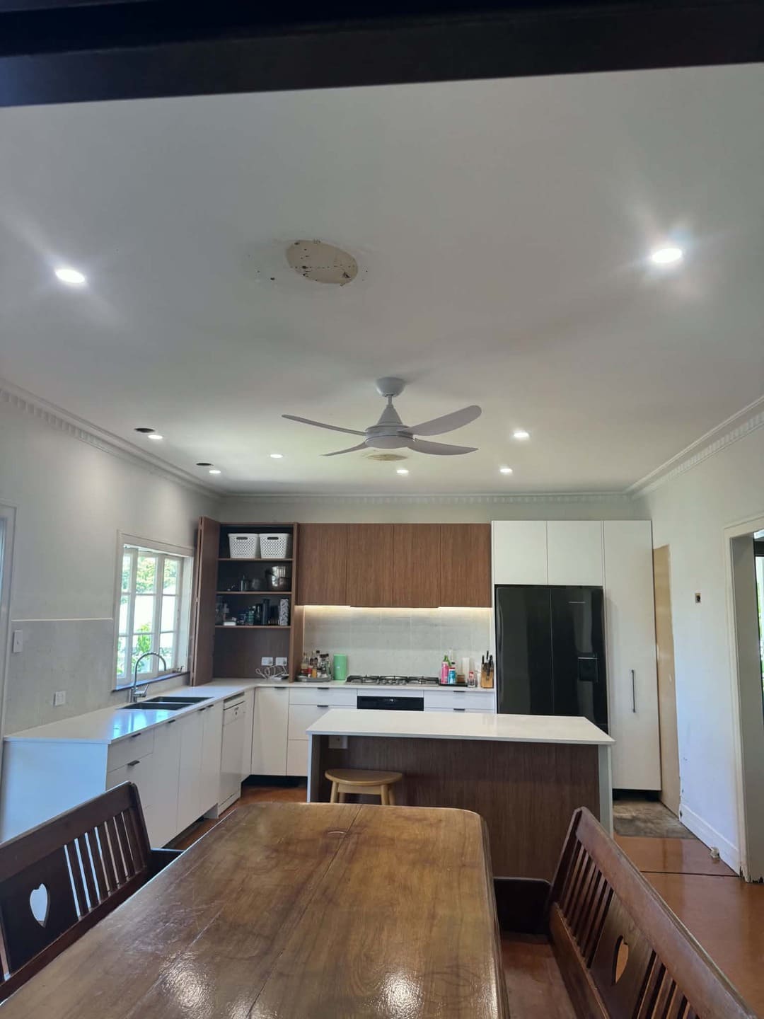 Kitchen ceiling fan and downlight electrical wiring completed by Total Blackout Electrical