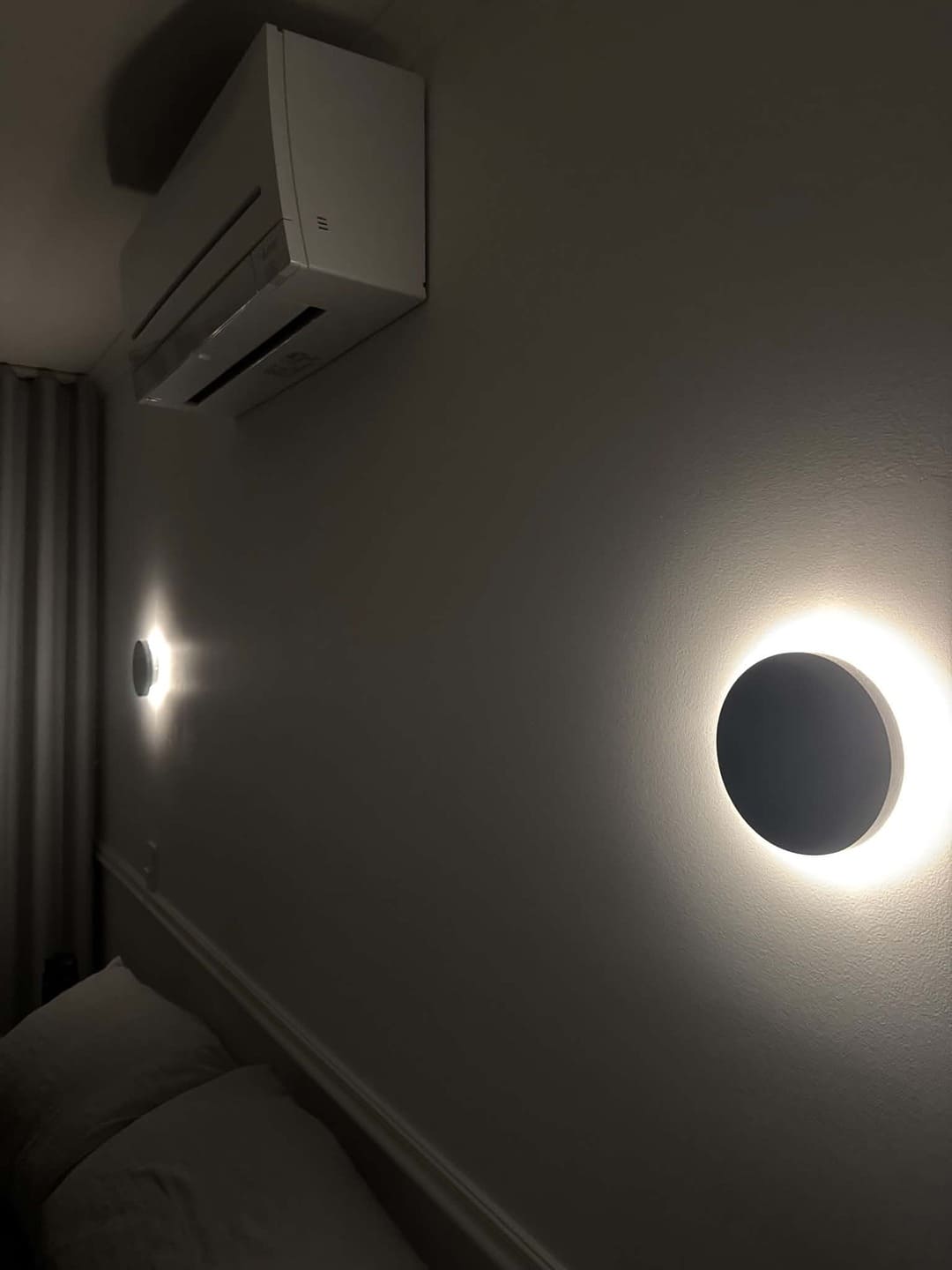 Wall lights and air conditioning installation by Total Blackout Electrical