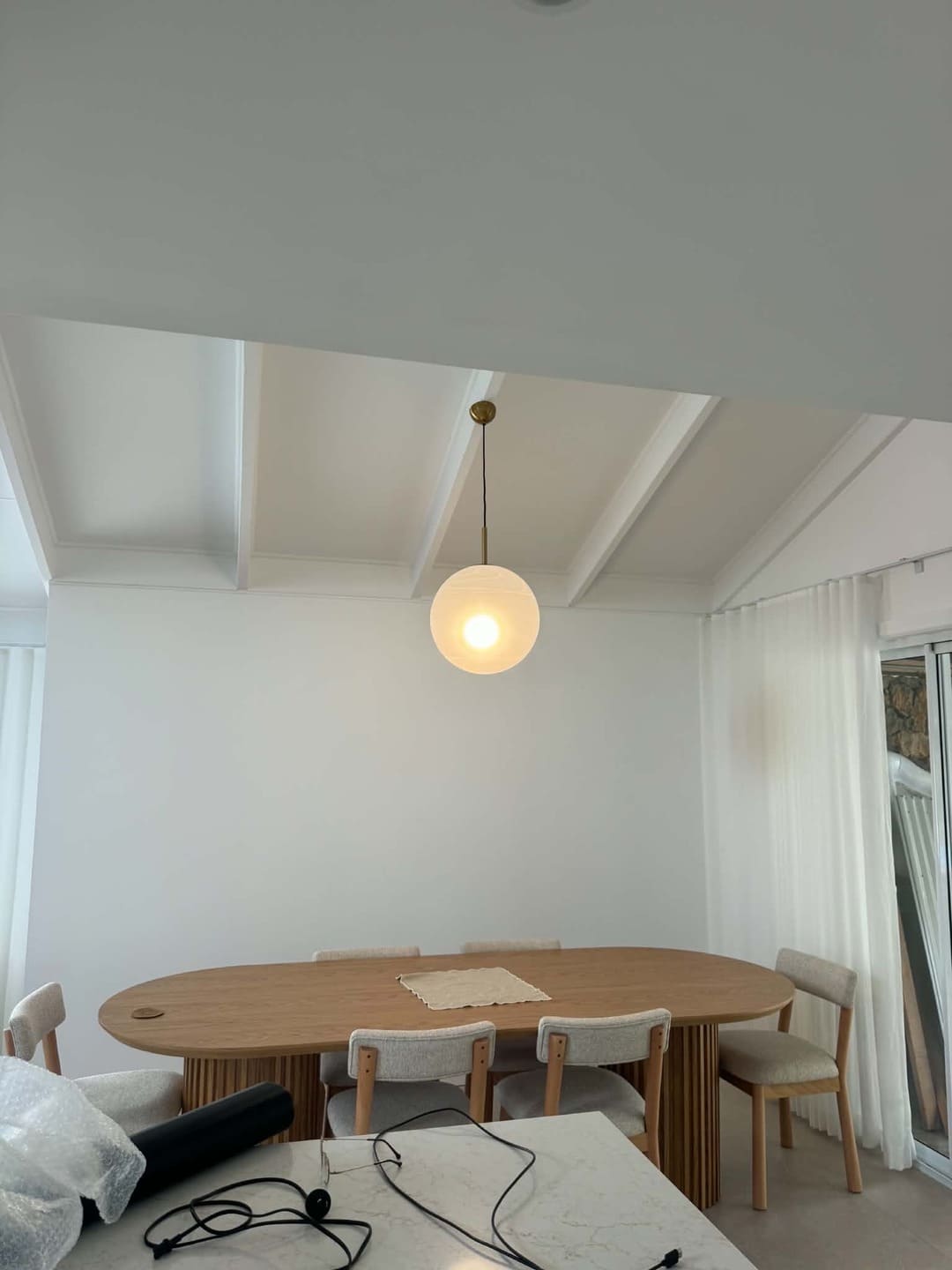 Feature dining room pendant lighting and electrical installation by Total Blackout Electrical