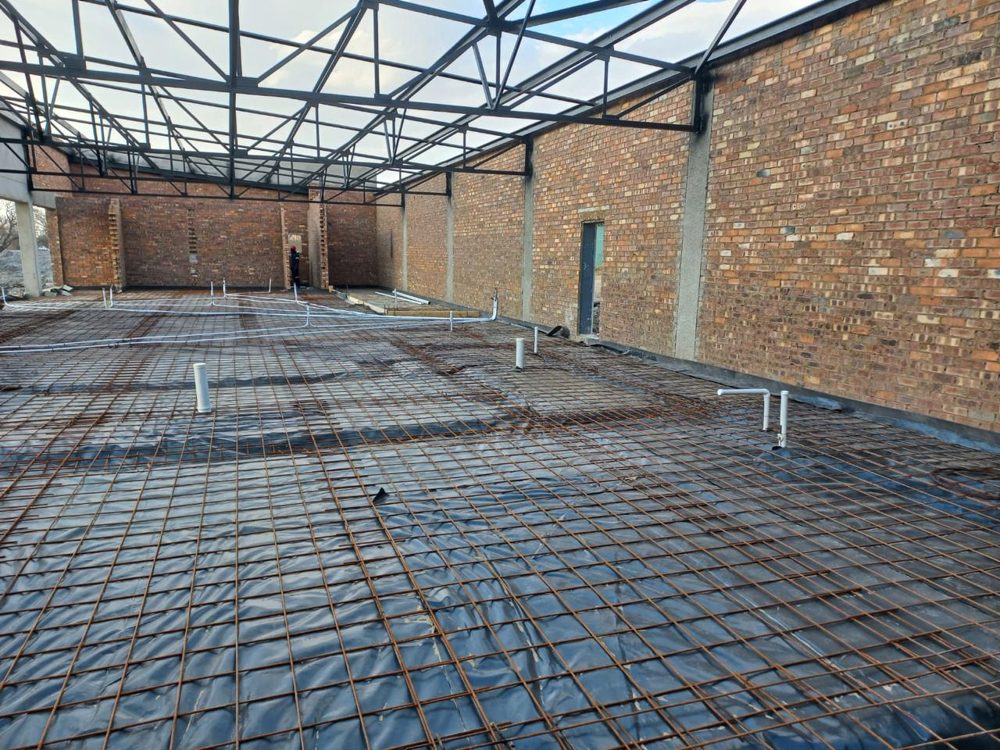 Reinforcing mesh laid for a floor slab under a steel frame at the SPAR Botswana DC