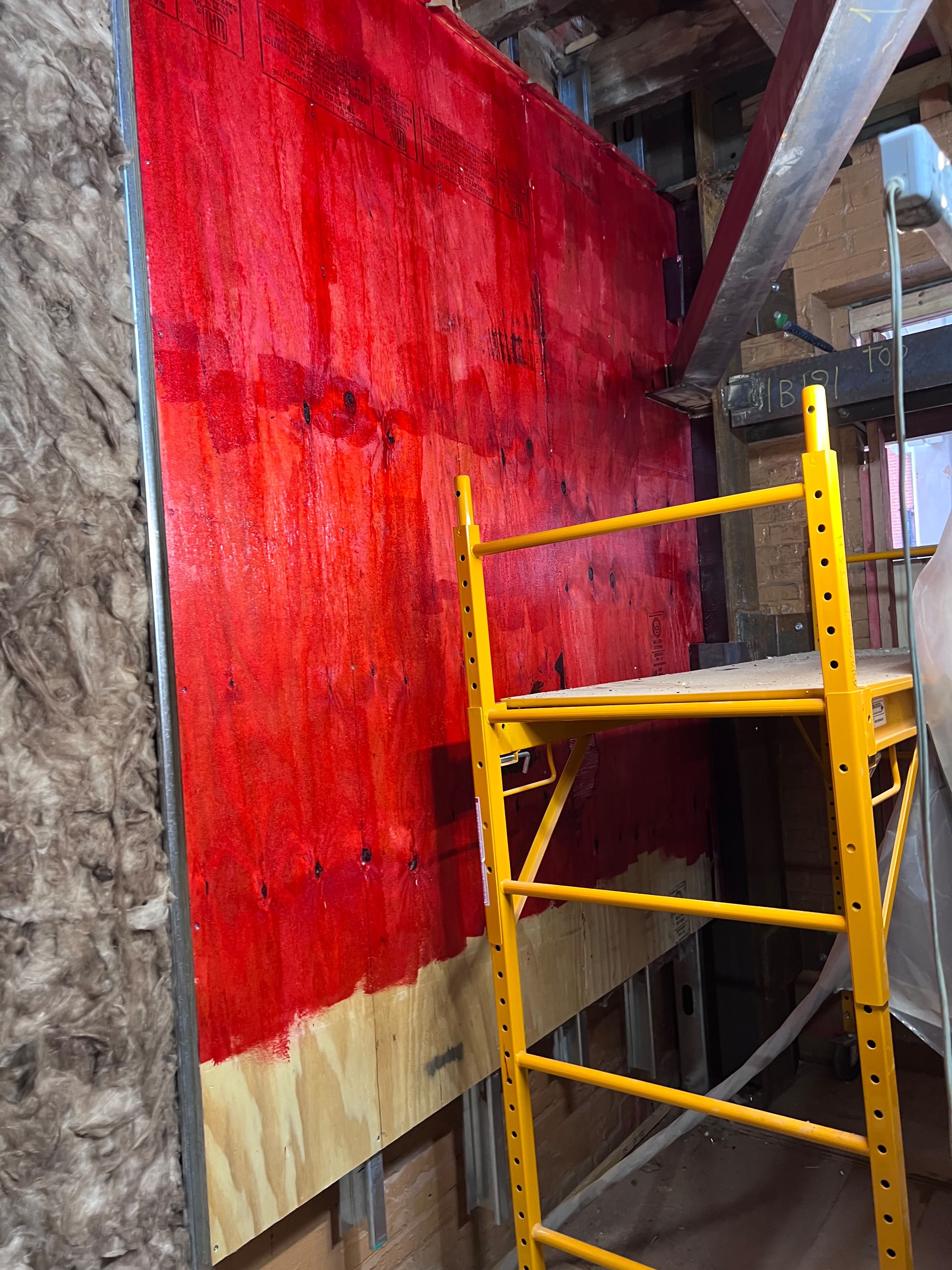 Structural interior wall framing and fire barrier insulation by LQJ General Construction in Smithtown NY