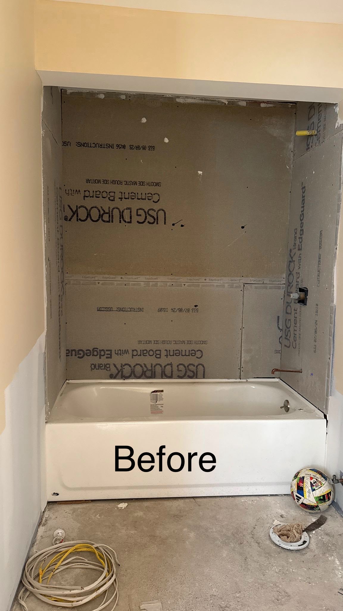 Before renovation view of bathtub installation and USG Durock cement board rough-in by LQJ General Construction in Smithtown NY