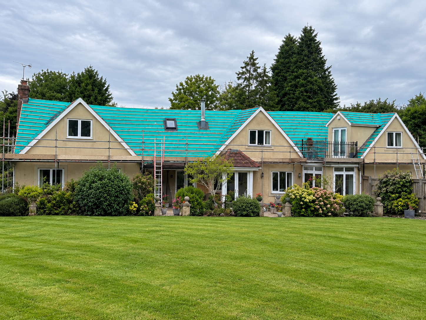 Large residential property re-roof with green breathable membrane and treated battens