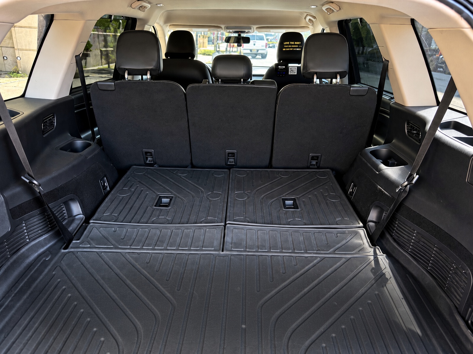 Spacious open cargo area of Lincoln Aviator with protective all-weather liner