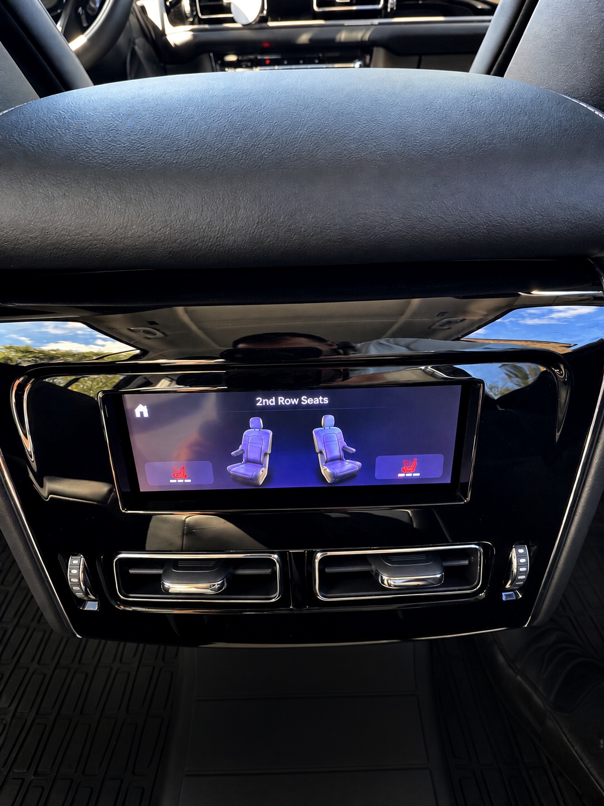 Rear console touch controls showing heated second-row seats in Lincoln Aviator