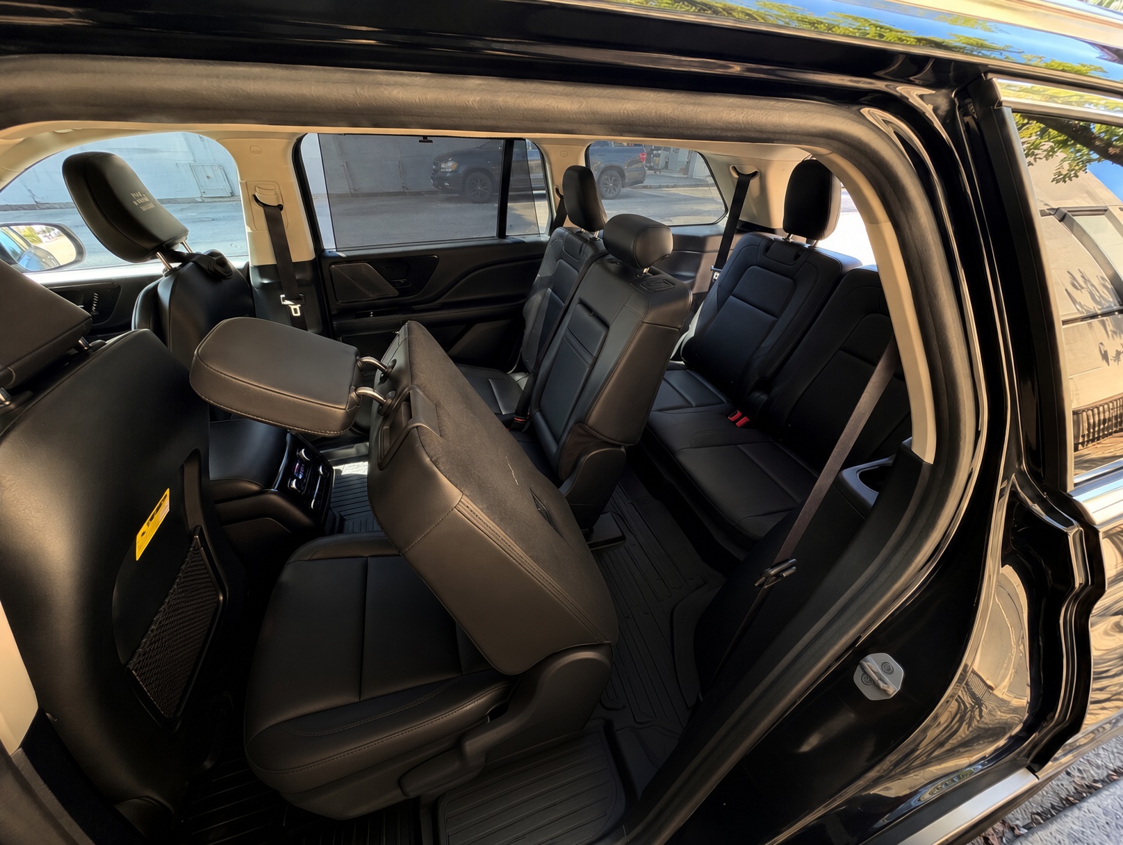 Spacious three-row seating interior view of Lincoln Aviator passenger cabin