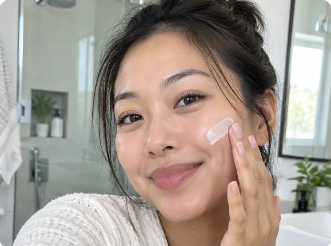 Creator applying skincare product