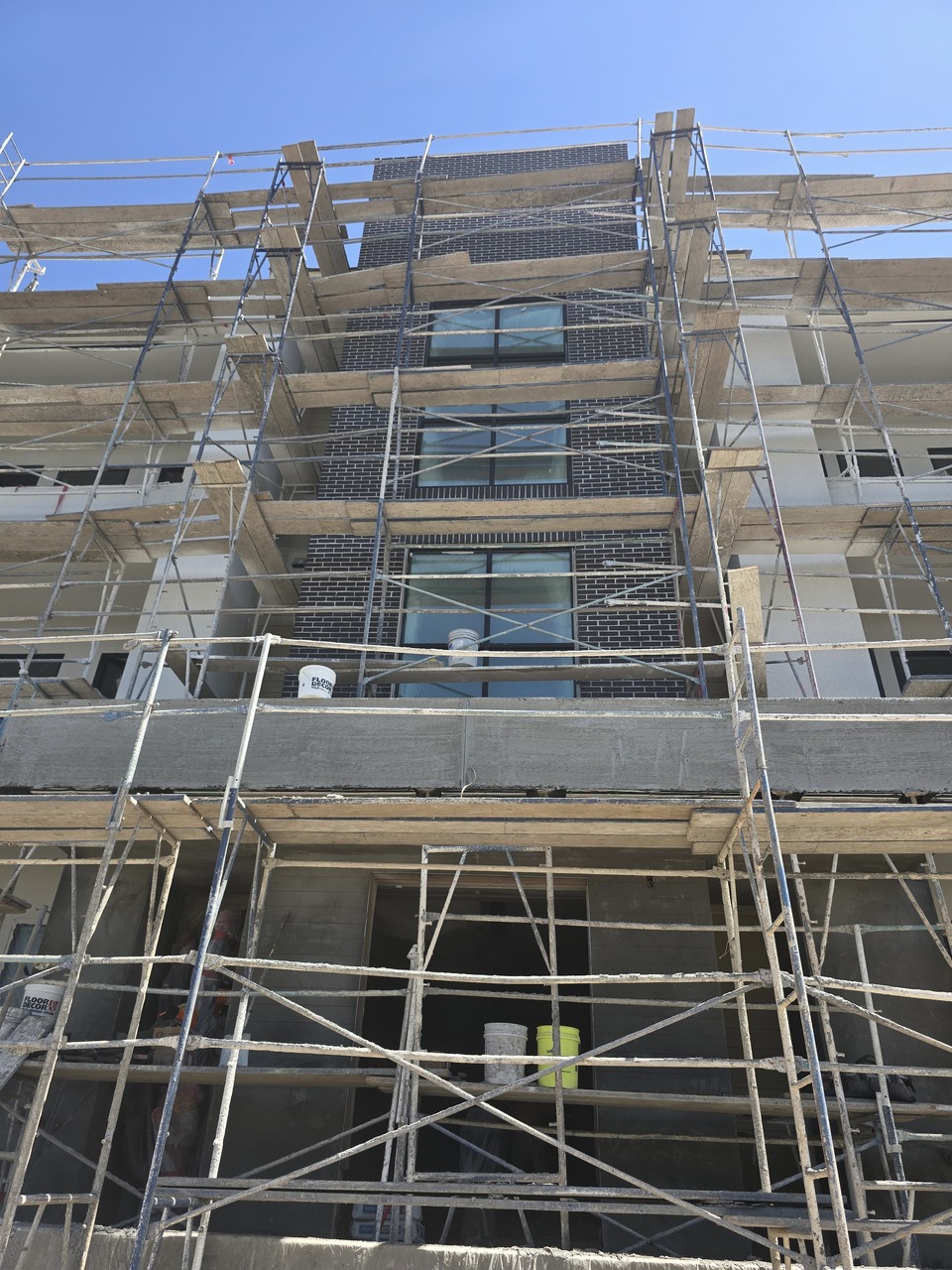 Multi-Story Commercial Brick Facade & Scaffolding