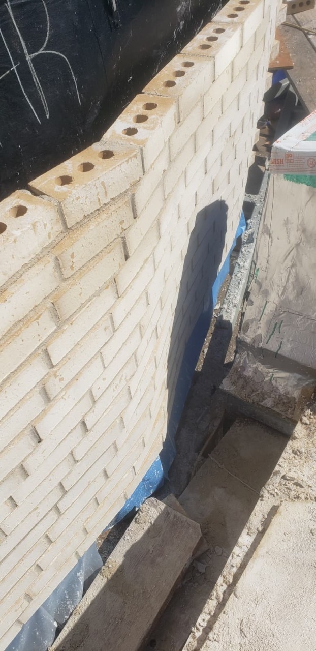 Reinforced Structural Brick Wall Under Construction