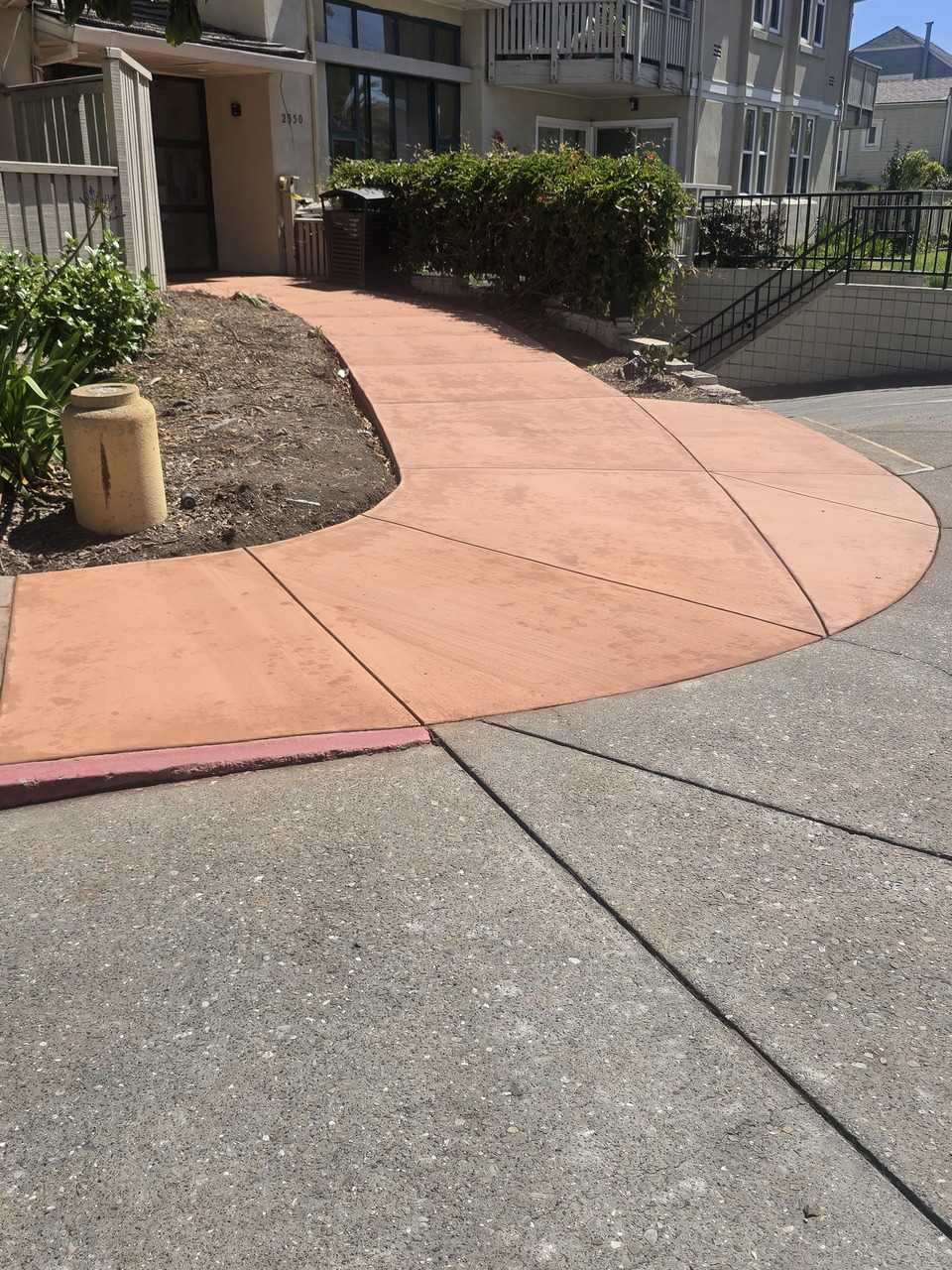 Curved Tinted Concrete Walkway Flatwork