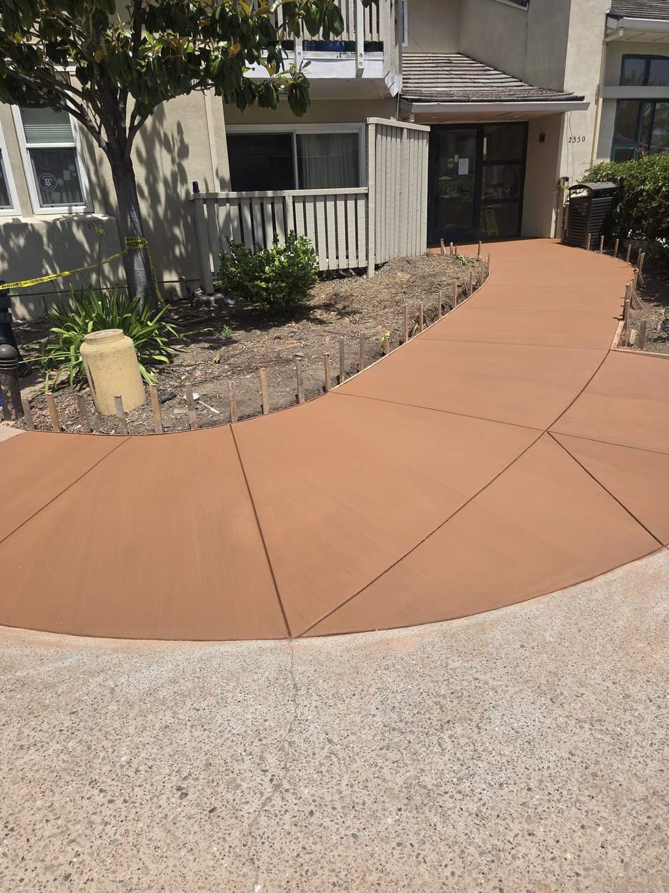 Radial Architectural Concrete Walkway & Landscape Integration